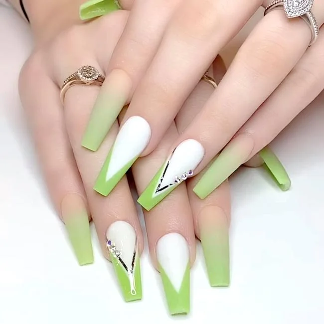 Green and white nail art